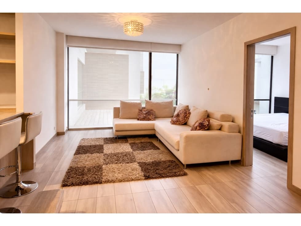 Suite amoblada en venta en Cumbayá - Edificio Aurora sobre Ruta Viva — foto 3